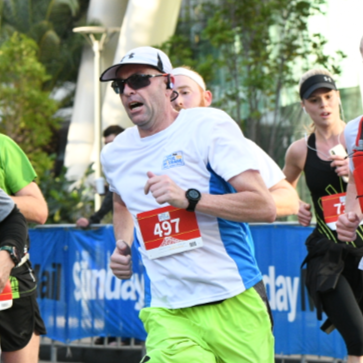 Adam Leishman running in a road race